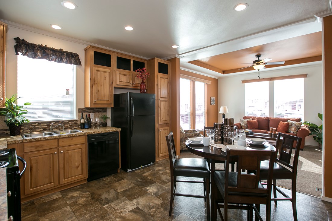 The ING382F REDWOOD II   (FULL) GW Kitchen. This Manufactured Mobile Home features 2 bedrooms and 2 baths.