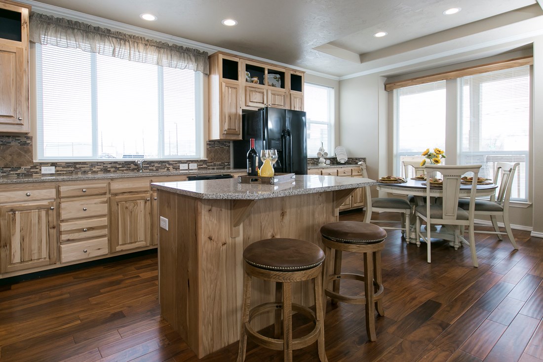 The THE SPRUCE Kitchen. This Manufactured Mobile Home features 3 bedrooms and 2 baths.