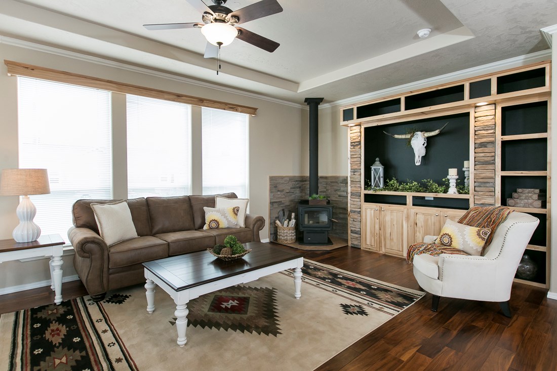 The THE SPRUCE Living Room. This Manufactured Mobile Home features 3 bedrooms and 2 baths.