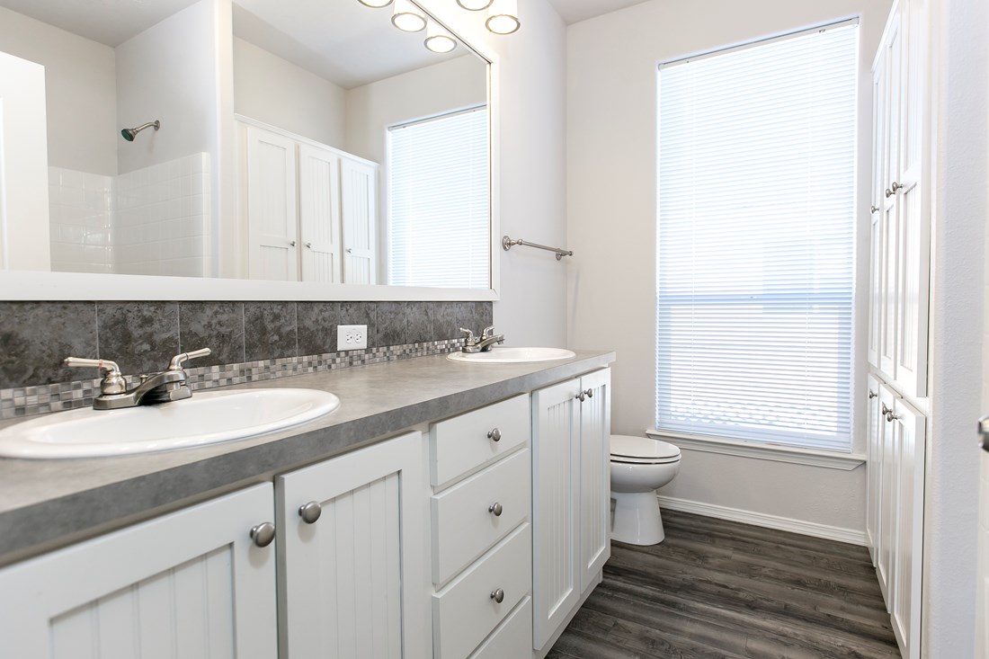 The ING681F EUCALYPTUS   (FULL) GW Guest Bathroom. This Manufactured Mobile Home features 3 bedrooms and 2 baths.