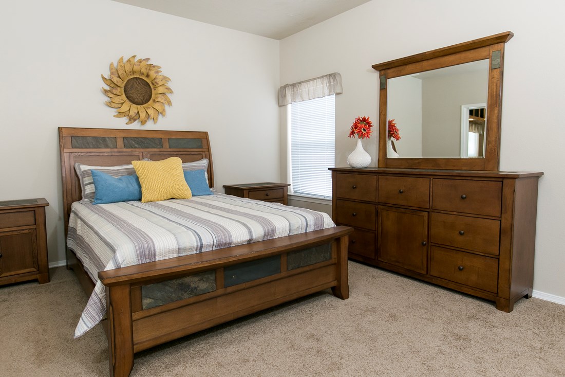 The THE SPRUCE Master Bedroom. This Manufactured Mobile Home features 3 bedrooms and 2 baths.