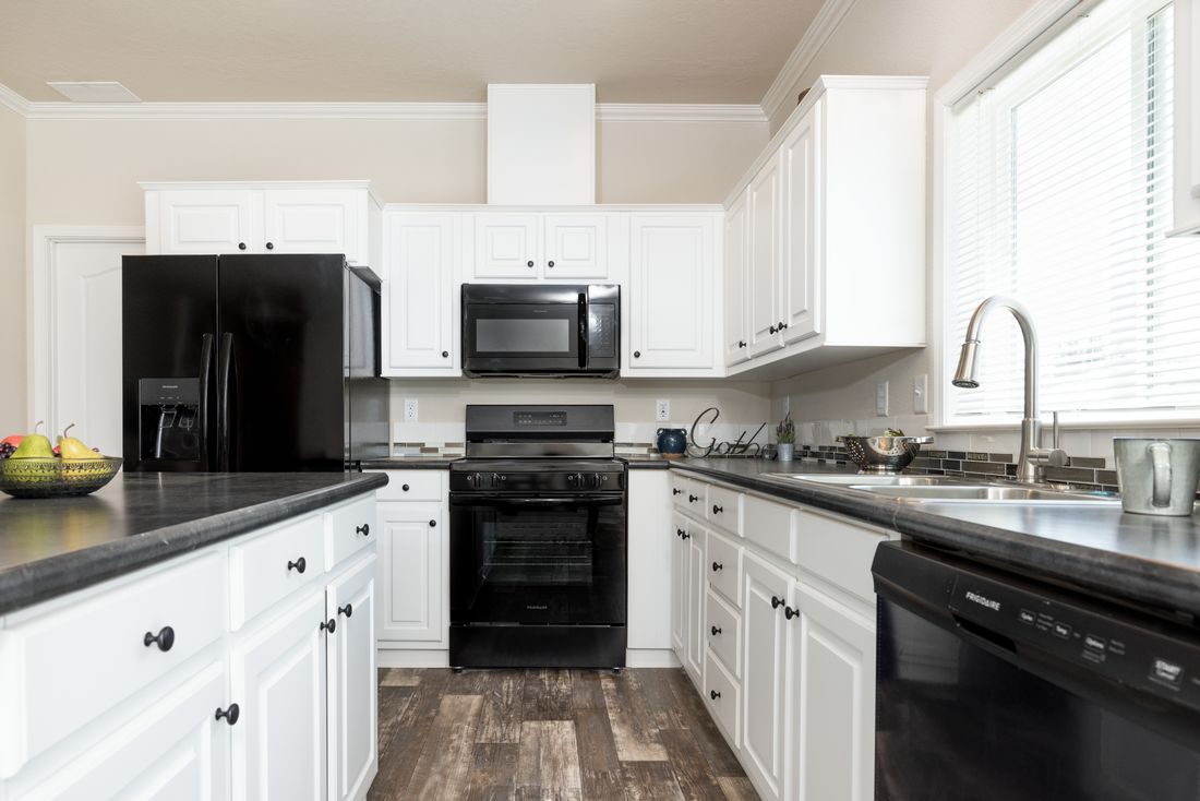 The TH482F CLAYTON Kitchen. This Manufactured Mobile Home features 2 bedrooms and 2 baths.