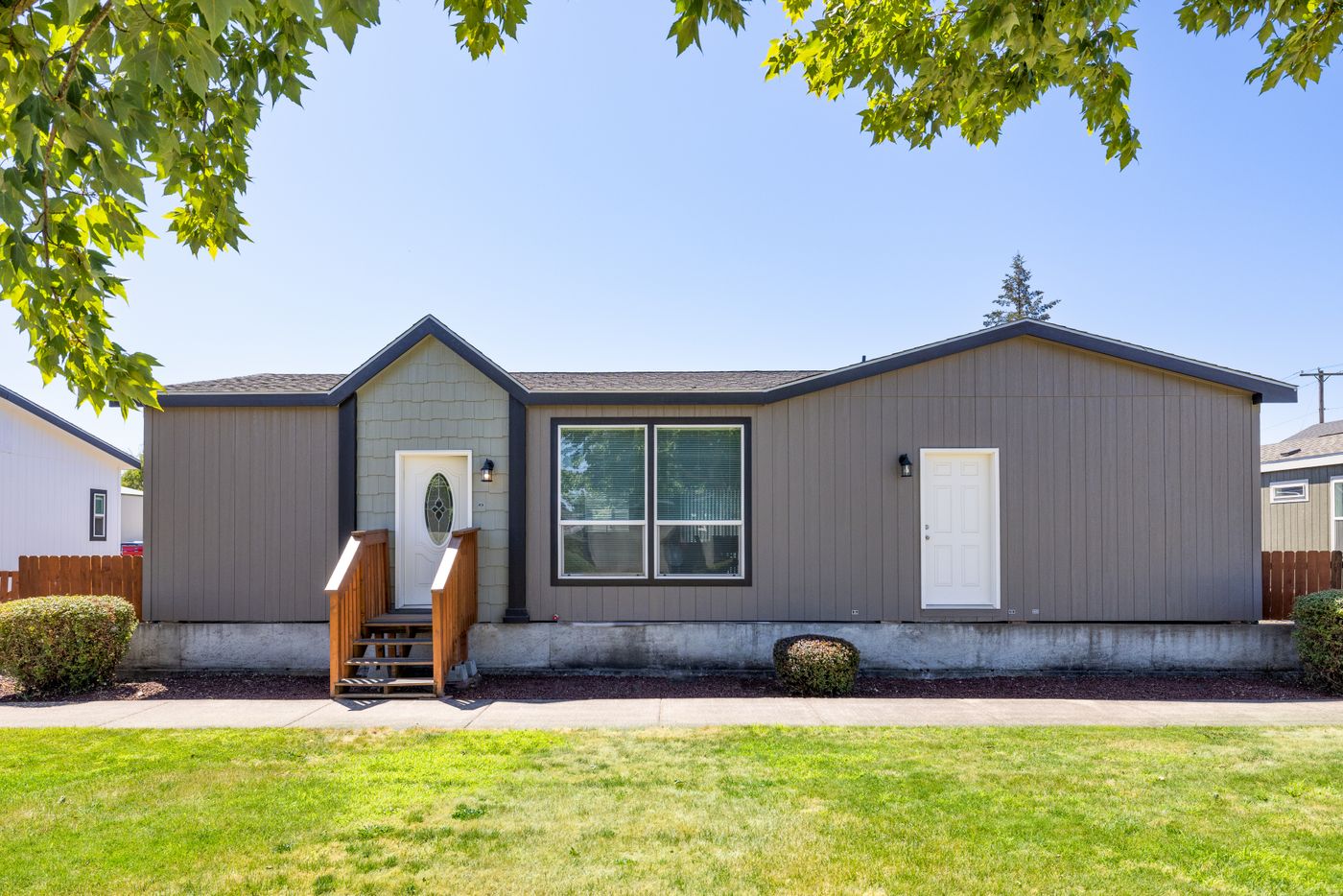 The TH482F CLAYTON Exterior. This Manufactured Mobile Home features 2 bedrooms and 2 baths.