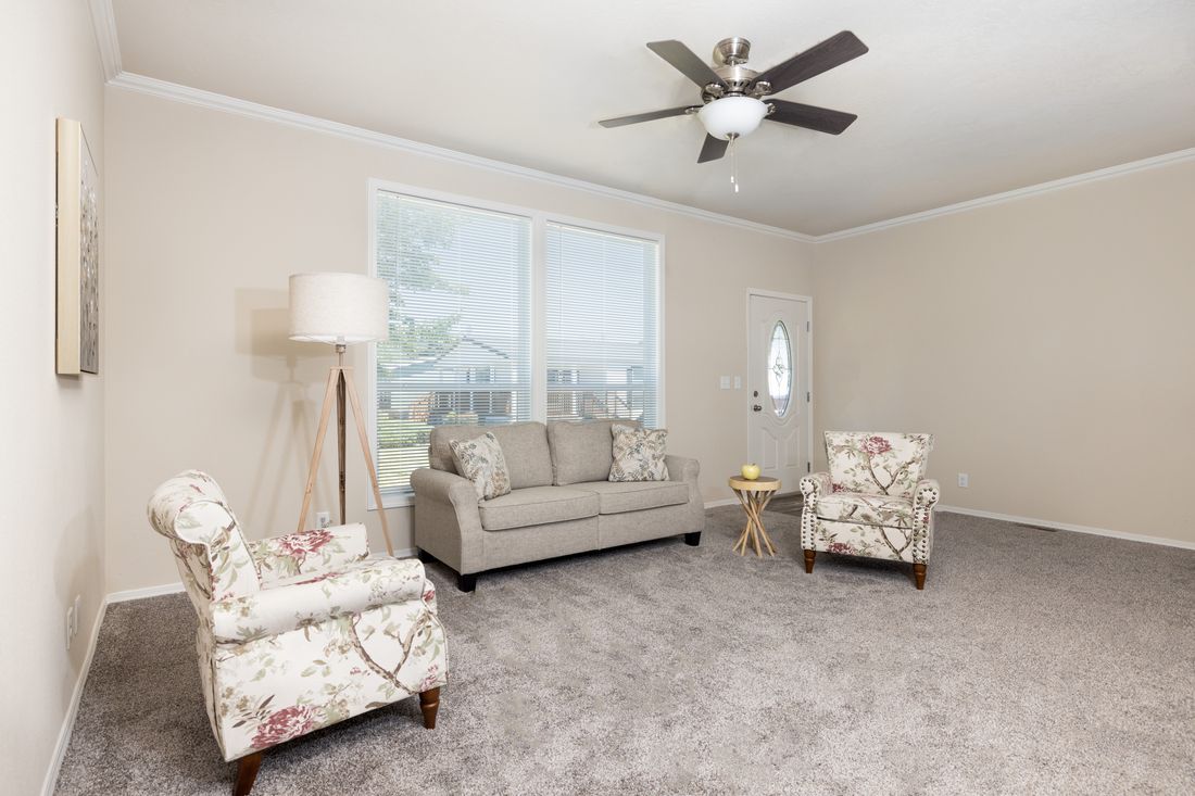 The TH482F CLAYTON Living Room. This Manufactured Mobile Home features 2 bedrooms and 2 baths.