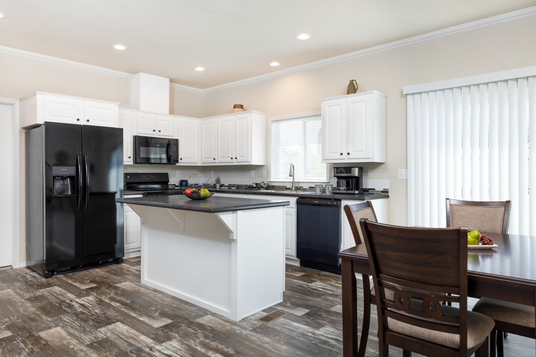 The TH482F CLAYTON Kitchen. This Manufactured Mobile Home features 2 bedrooms and 2 baths.