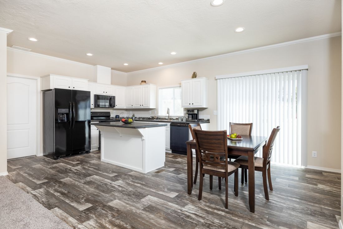 The TH482F CLAYTON Kitchen. This Manufactured Mobile Home features 2 bedrooms and 2 baths.