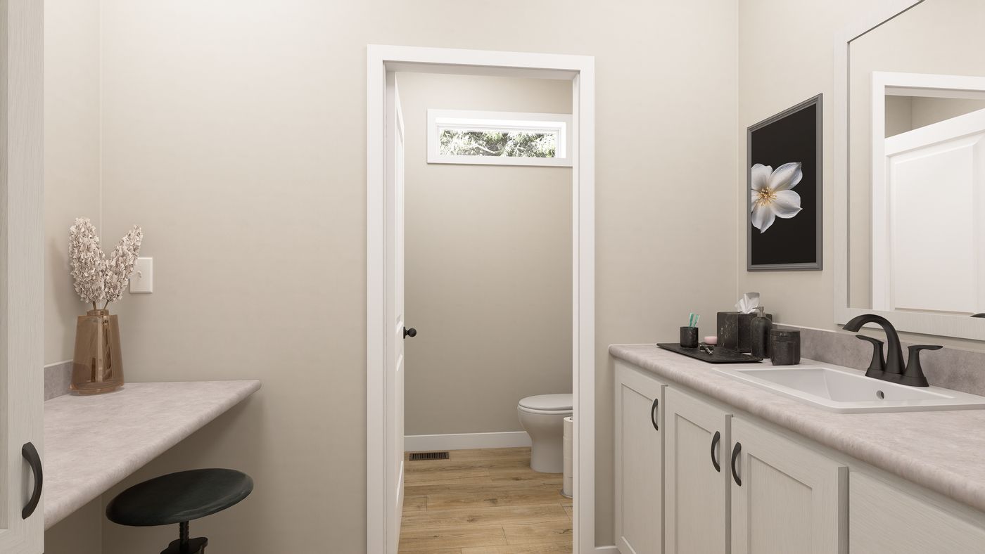 The ING764G WEEPING WILLOW GW Guest Bathroom. This Manufactured Mobile Home features 4 bedrooms and 2 baths.