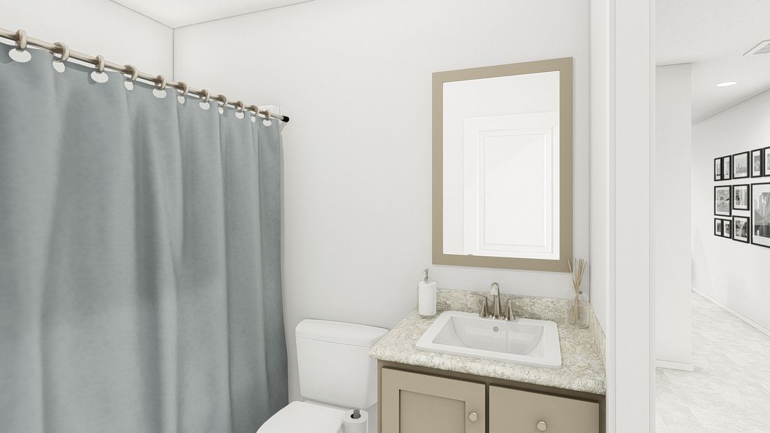 The DRM603N 1560' DREAM Guest Bathroom. This Manufactured Mobile Home features 2 bedrooms and 2 baths.